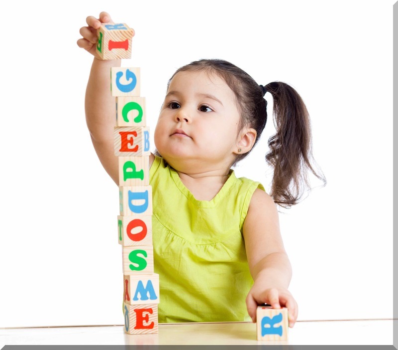 child girl playing with block toys